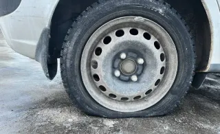 Screenshot of Github's UI with the fork-button hilighted A car with a flat tire