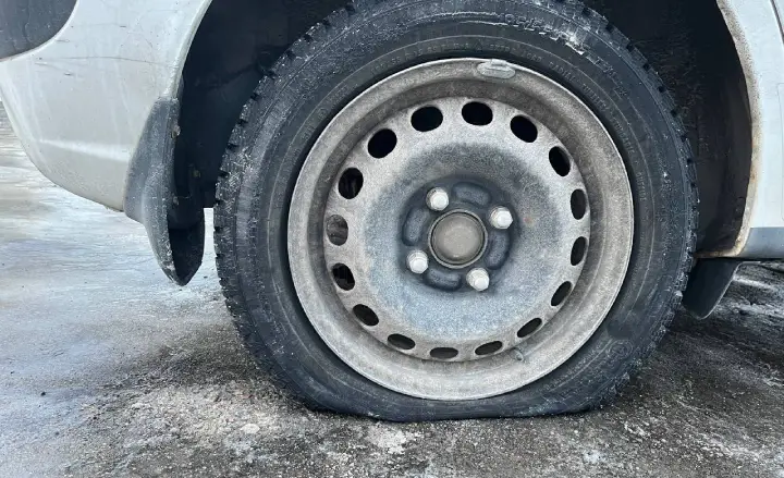 A car with a flat tire